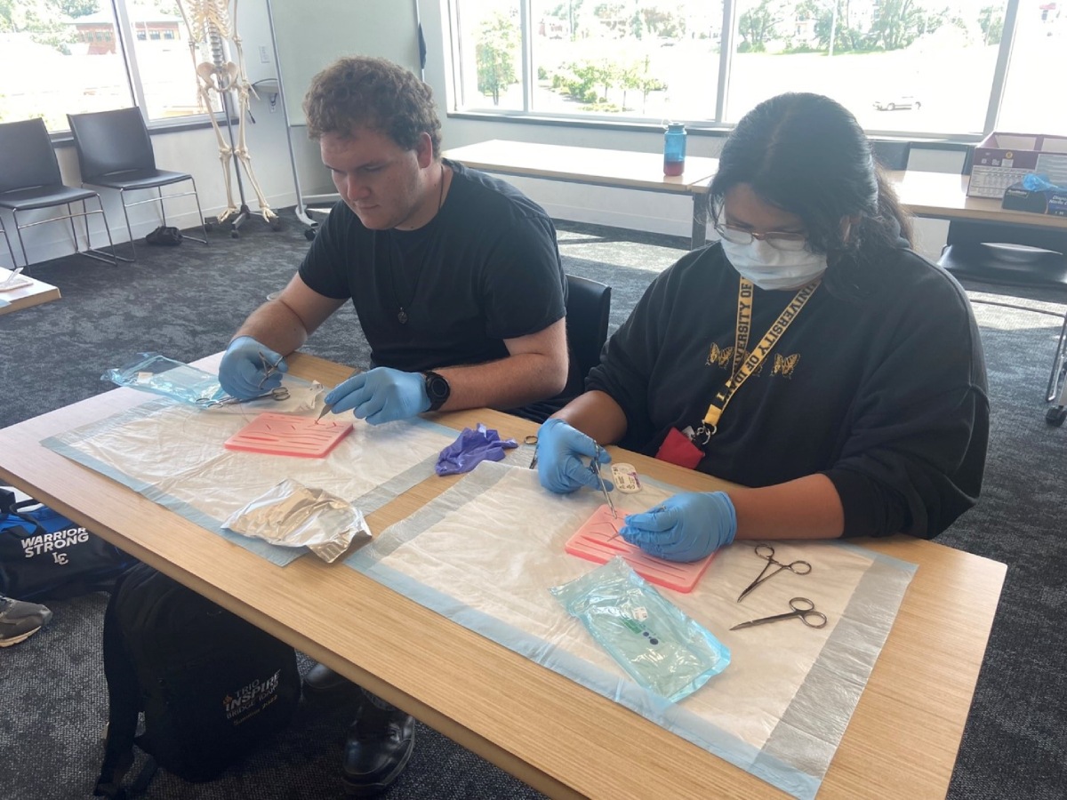 students working at hands on health care