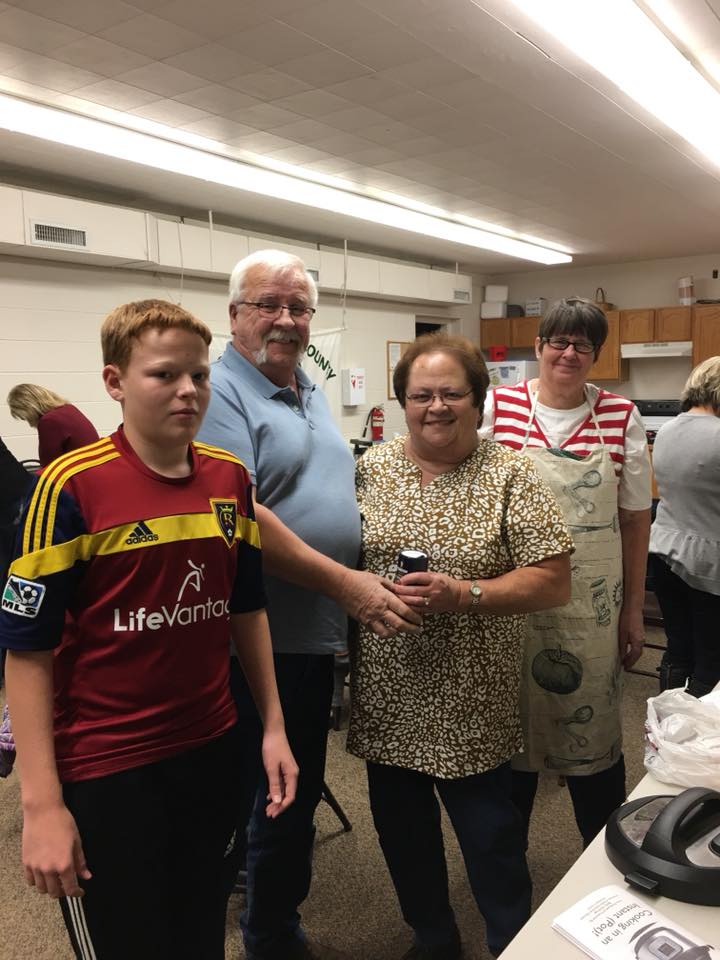 Child and grandparents at cooking class